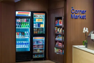 two refrigerators in a store with drinks in them at Fairfield Inn & Suites by Marriott San Diego North/San Marcos in San Marcos
