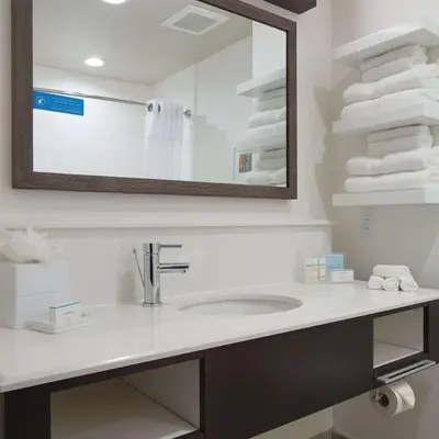 a bathroom with a sink and a mirror at Hampton Inn & Suites Murrieta Temecula in Murrieta