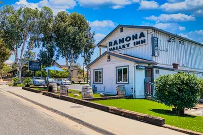 a building with a sign that reads ramona valley inn at Ramona Valley Inn - Ramona in Ramona