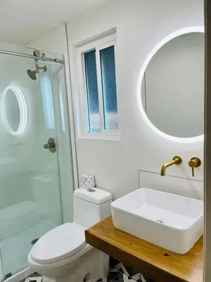 a bathroom with a sink and a toilet and a shower at Ramona Valley Inn - Ramona in Ramona