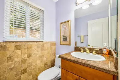 a bathroom with a sink and a toilet at The Shangri-La of La Jolla in San Diego