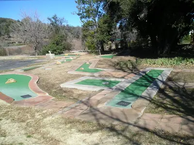 a group of miniature golf courses in a park at Oakzanita Springs Camping Resort Cabin 1 in Descanso