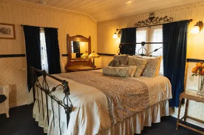 a bedroom with a large bed in a room at Julian Gold Rush Hotel in Julian