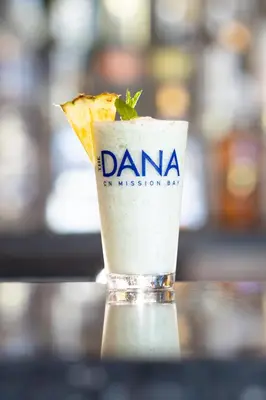 a drink with a slice of pizza in a glass at The Dana on Mission Bay in San Diego