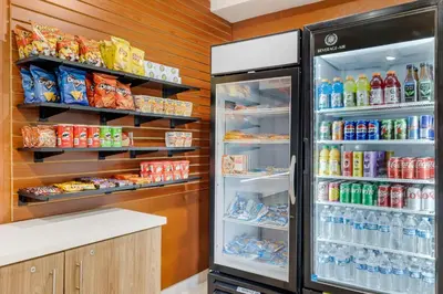 a refrigerator filled with lots of drinks and food at Best Western Carlsbad by the Sea in Carlsbad