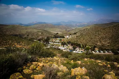 a small town in the middle of a mountain at Pio Pico Camping Resort Cottage 1 in Jamul