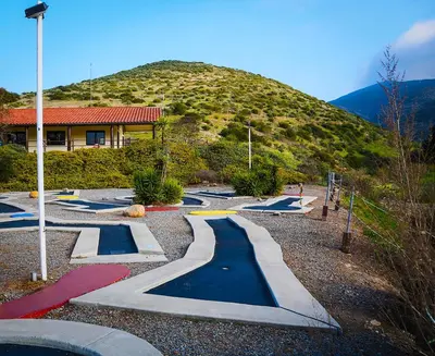 a bunch of skate ramps in front of a hill at Pio Pico Camping Resort One-Bedroom Cabin 13 in Jamul