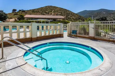 a swimming pool with aitamin at Pio Pico Camping Resort One-Bedroom Cabin 14 in Jamul