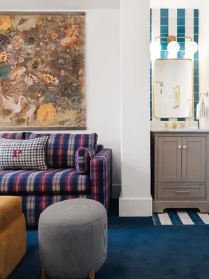 a living room with a couch and a table at Palihotel San Diego Gaslamp Quarter in San Diego