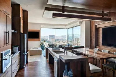 a kitchen with a view of a living room at Marriott Irvine Spectrum in Irvine
