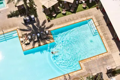 an overhead view of a swimming pool at a resort at Marriott Irvine Spectrum in Irvine