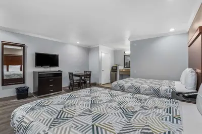 a hotel room with a bed and a television at Motel 6 Carlsbad, Ca- North in Carlsbad