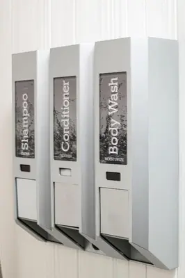 a row of cash machines hanging on a wall at Brisa Pacific Hotel Encinitas in Encinitas