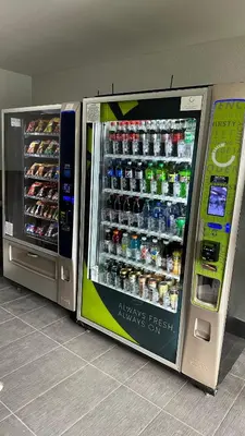 a drink vending machine in a store at Studio 6 Suites San Ysidro CA San Diego South Bay in San Ysidro, San Diego