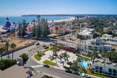 an aerial view of a city with a beach at Glorietta Bay Inn in San Diego