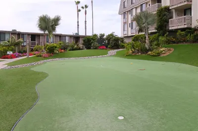 a putting green with a golf ball on it at North Coast Village Retreat B111 in Oceanside