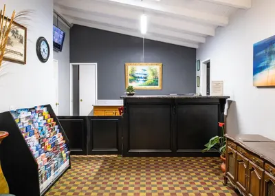 a store with a counter in a room at Fallbrook Country Inn in Fallbrook