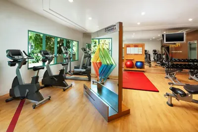 a gym with treadmills ellipticals and exercise bikes at Sheraton La Jolla in San Diego