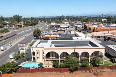 an aerial view of a city with a street at Motel Mediteran in Escondido