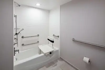 a bathroom with a sink and a shower stall at Homewood Suites By Hilton San Diego Central in San Diego