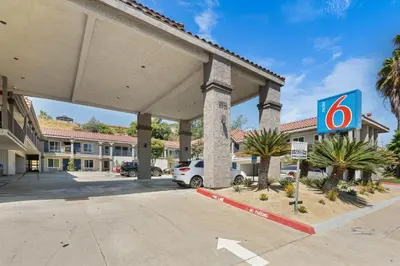 a sign in front of a hotel parking lot at Motel 6-La Mesa, CA in San Diego