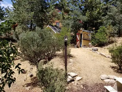 a sign in the middle of a dirt road at Time Traveler Retreat in Julian