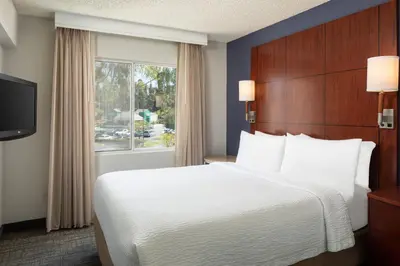 a hotel room with a bed and a window at Sonesta ES Suites Carmel Mountain - San Diego in San Diego