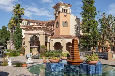 a large house with a fountain in front of it at Marriott's Newport Coast Villas in Newport Beach