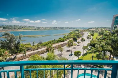 a view of a river from a balcony at Newport Beach Marriott Bayview in Newport Beach