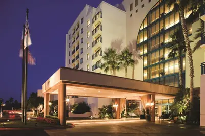 a hotel building with a flag in front of it at Newport Beach Marriott Bayview in Newport Beach