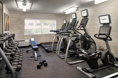 a gym with several treadmills and cardio machines at Courtyard by Marriott San Diego Sorrento Valley in Sorrento