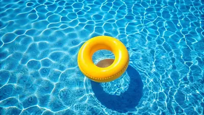 a yellow rubber ring in a swimming pool at San Diego Country Estates in Ramona