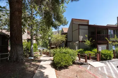 a building with a tree in front of it at San Diego Country Estates in Ramona