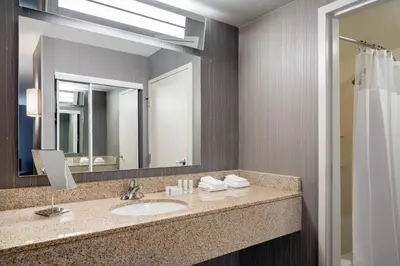 a bathroom with a sink and a mirror at Courtyard Foothill Ranch Irvine East/Lake Forest in Foothill Ranch