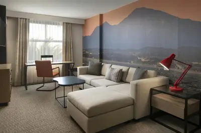 a living room with a couch and a table at Residence Inn Irvine John Wayne Airport Orange County in Irvine