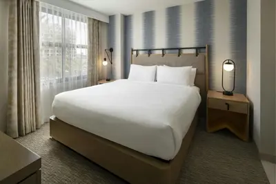 a bedroom with a large bed and a window at Residence Inn Irvine John Wayne Airport Orange County in Irvine