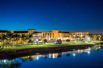 a city at night with a river and buildings at Courtyard San Diego Airport/Liberty Station in San Diego