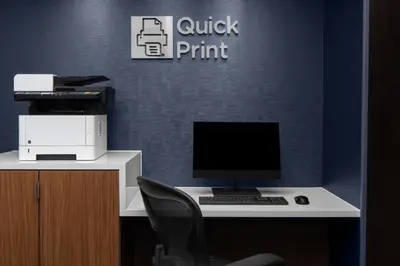 an office with a desk with a computer and a printer at Courtyard by Marriott San Diego Central in San Diego