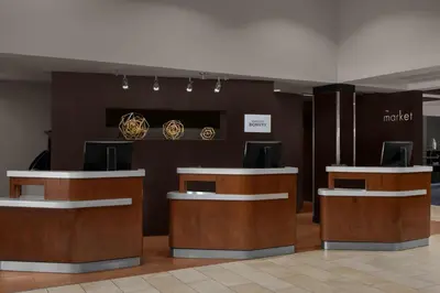 a lobby with brown and white counter tops in a building at Courtyard by Marriott San Diego Central in San Diego