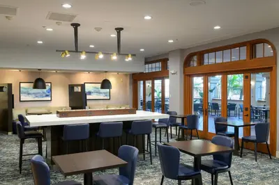 a lobby with a pool table and chairs at Courtyard San Diego Old Town in San Diego