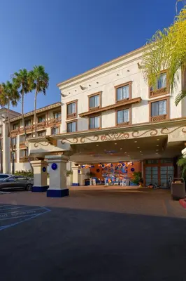 a hotel building with a parking lot in front of it at Courtyard San Diego Old Town in San Diego