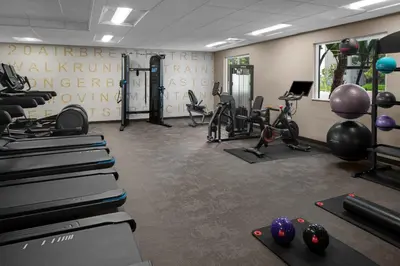 a gym with tread machines and exercise bikes at Residence Inn by Marriott San Diego Downtown in San Diego