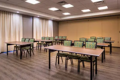 a conference room with tables and chairs in it at SpringHill Suites Temecula Valley Wine Country in Temecula