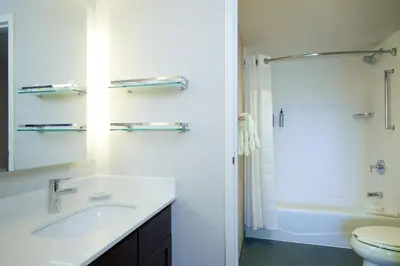a bathroom with a sink and a toilet and a shower at Residence Inn San Diego Carlsbad in Carlsbad