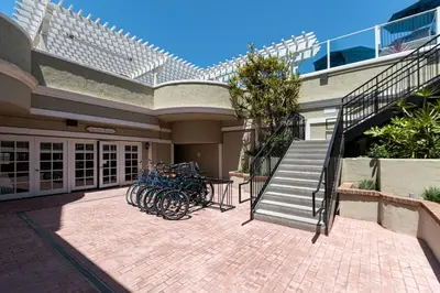 a group of bikes parked in front of a building at Carlsbad Inn Beach Resort in Carlsbad