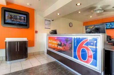 a large flat screen tv sitting in a room at Motel 6-El Cajon, CA - San Diego in El Cajon