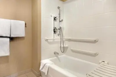 a bathroom with a shower and a bath tub at Residence Inn San Diego North/San Marcos in San Marcos