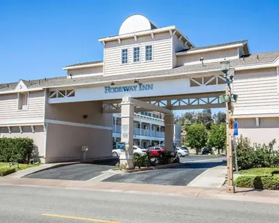 a hotel with a sign that reads recovery inn at Rodeway Inn Old Town Temecula in Temecula
