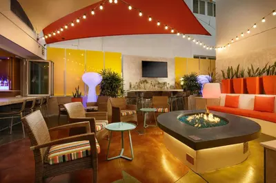 a living room with a fire pit in the middle at TownePlace Suites by Marriott San Diego Downtown in San Diego
