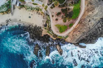 an aerial view of a beach and the ocean at Empress Hotel La Jolla in San Diego
